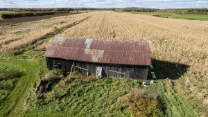 Photo of a Rustic Barn in Québec, Canada Cornfield Aerial View