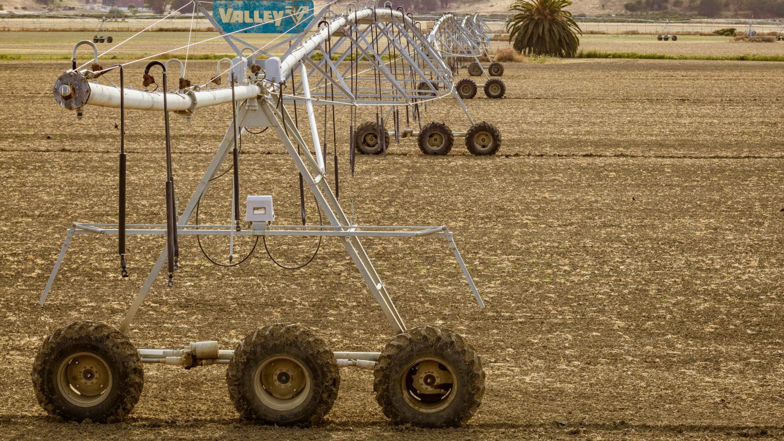 Photo of a lateral line Agricultural Sprinklers on a Farm Field