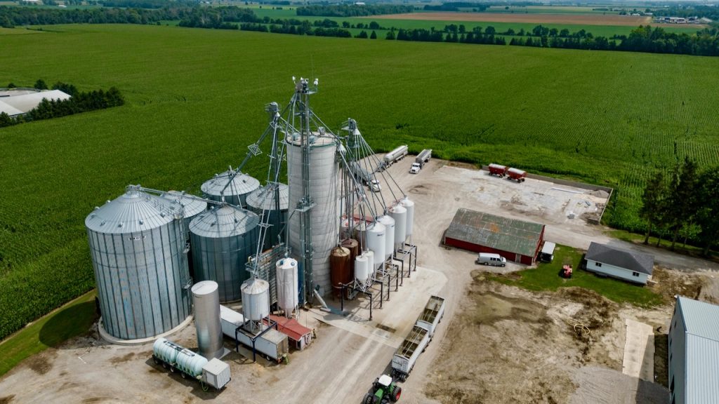 Photo of Silos Surrounded by Fields on a farm in Ontario, Canada.